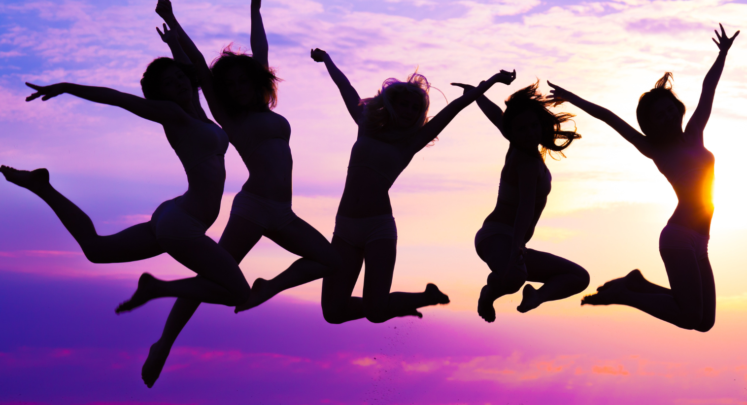 Dancers Feeling Freedom, jumping in the air